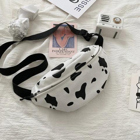 mtvrmall woman chest bag Korea INS cow canvas small messenger bag Japanese Harajuku style wild girl cute student chest bag Female pockets